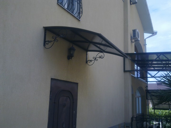 Козырьки с шумоизоляцией, отливы оконные,коньки-собственное прои